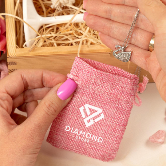 Pink jute pouch with a company logo