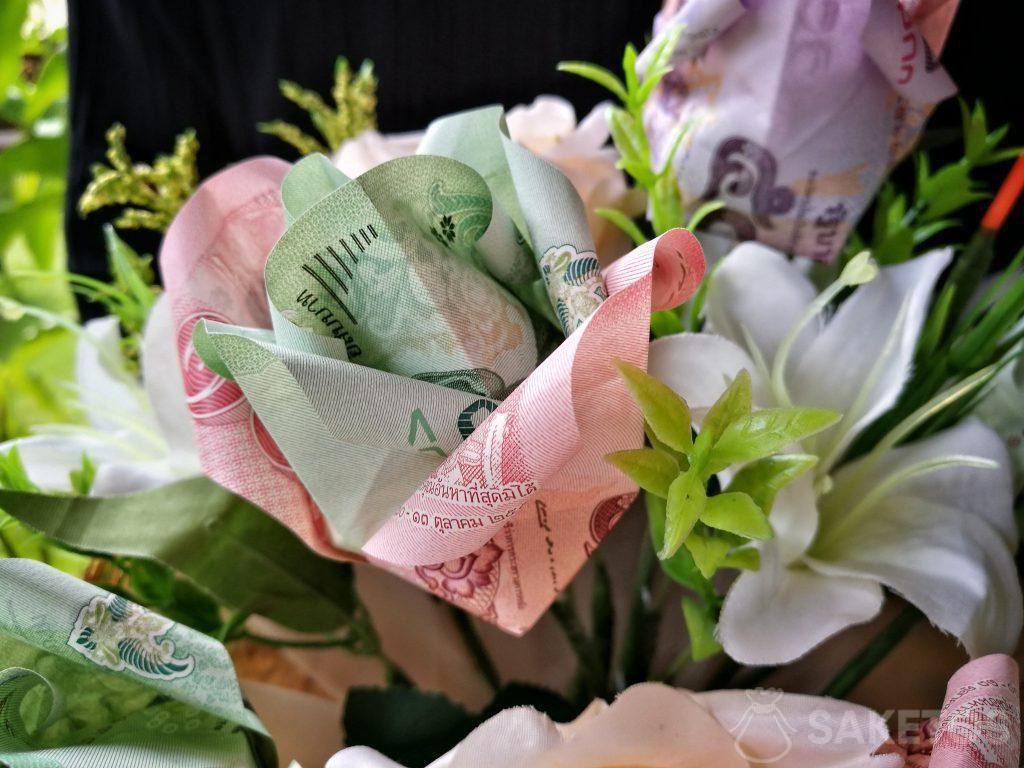 Wedding bouquet with origami flowers made of banknotes