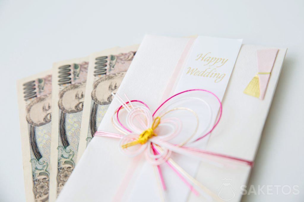 Money inserted into the wedding greeting card
