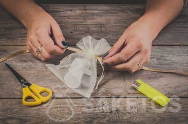 How to make a bow using a ribbon on an organza bag - step 2