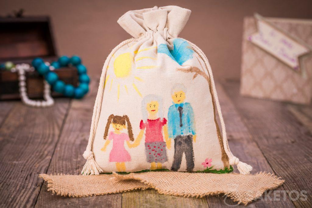 Linen gift bag for loved ones, decorated with acrylic paints