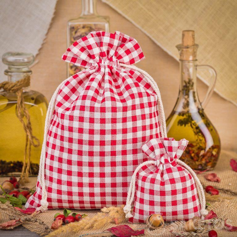 Fashionable red checkered linen bags are a great decoration for a kitchen counter or shelf