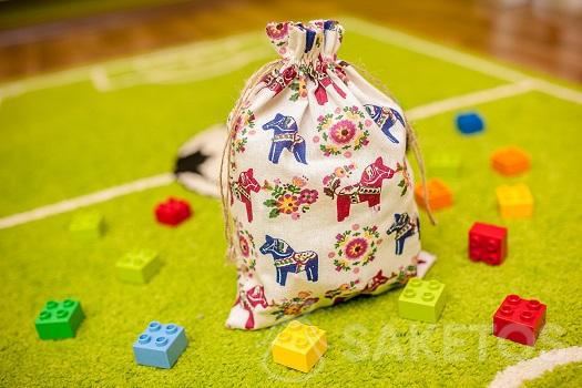 Decorative bags suited to a child's room, perfect for storing Lego Duplo blocks