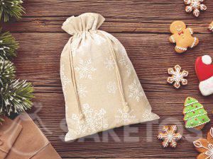 Printed linen bags for Christmas featuring snowflakes