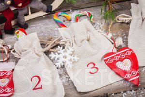 an Advent calendar made from linen pouches 