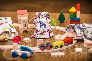 6.Wooden blocks and tracks in linen bags