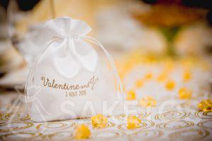 White satin wedding pouch with gold print