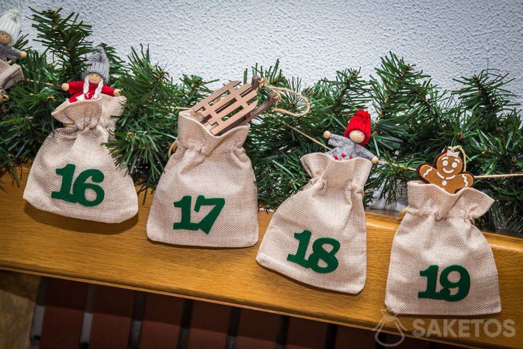 An Advent calendar with Christmas tree decorations