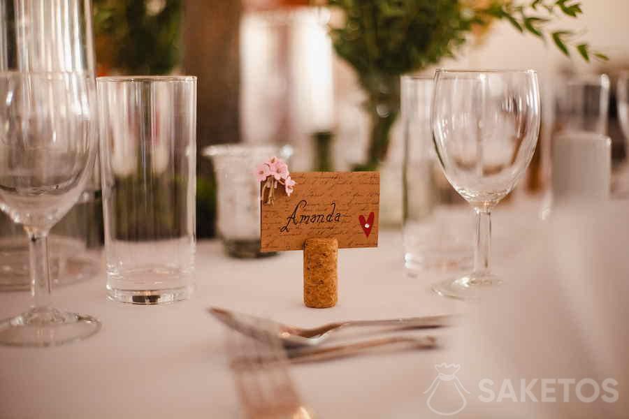 Wine cork as a stand for traditional place cards on the table