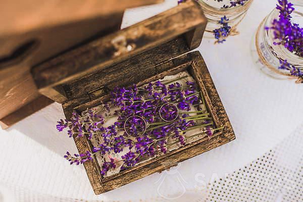 Wedding rings on lavender flowers
