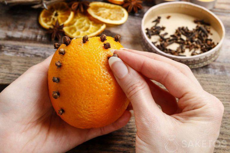 Eco decoration for the Christmas table - aromatic orange with cloves