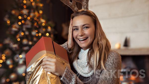 Elegant gold bag as Christmas gift wrapping