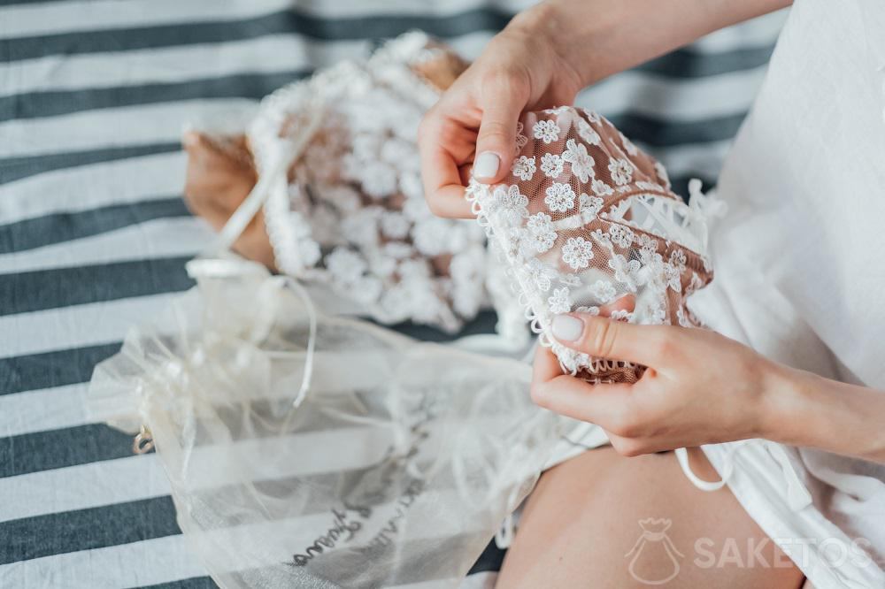 Lace wedding underwear for the bride in an organza bag