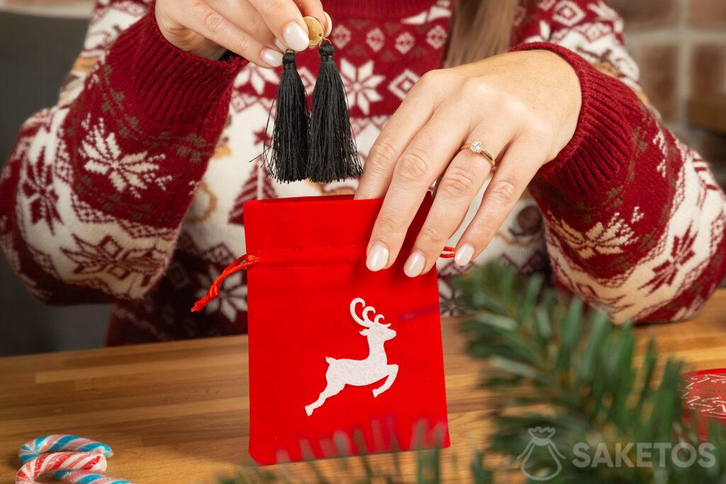 A red velvet pouch – a decorative addition to a Burr Basket