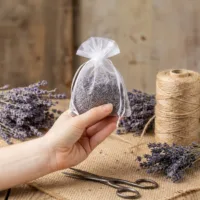 White organza bags filled with dried lavender as a wardrobe scent.