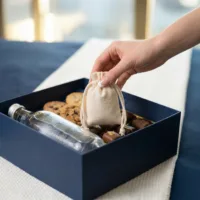 Eco-friendly cotton pouches as natural gift packaging in a box.