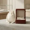 Natural cotton bag next to an elegant box with an engagement ring.
