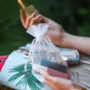 An organza pouch used as a gift wrap for beauty products.