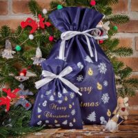 Nonwoven bags sized 20 x 30 cm, with Christmas-themed print All products