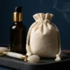 Cotton bags for wellness tools and cosmetic oils.