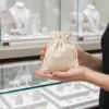 Linen bags used as packaging for jewellery in retail display