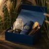 Wellness gift box with linen pouch and towel.