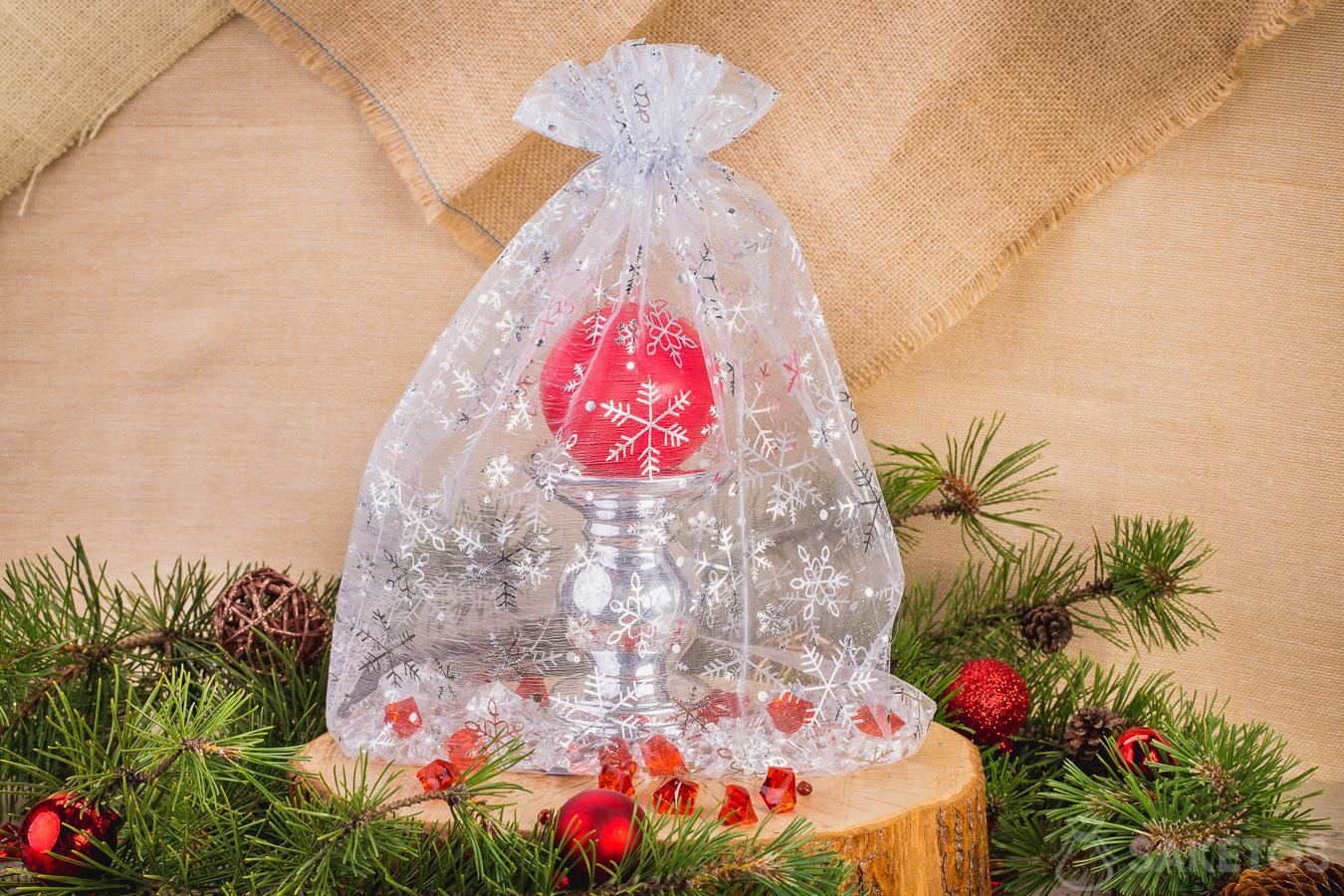 An organza bag can also be packaging for a candle holder 