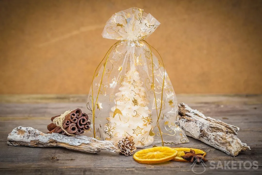 Christmas - rustic or modern interior style 2 Christmas organza bags used as packaging for a candle