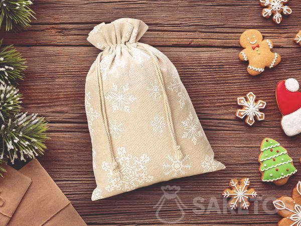 Printed linen bags for Christmas featuring snowflakes