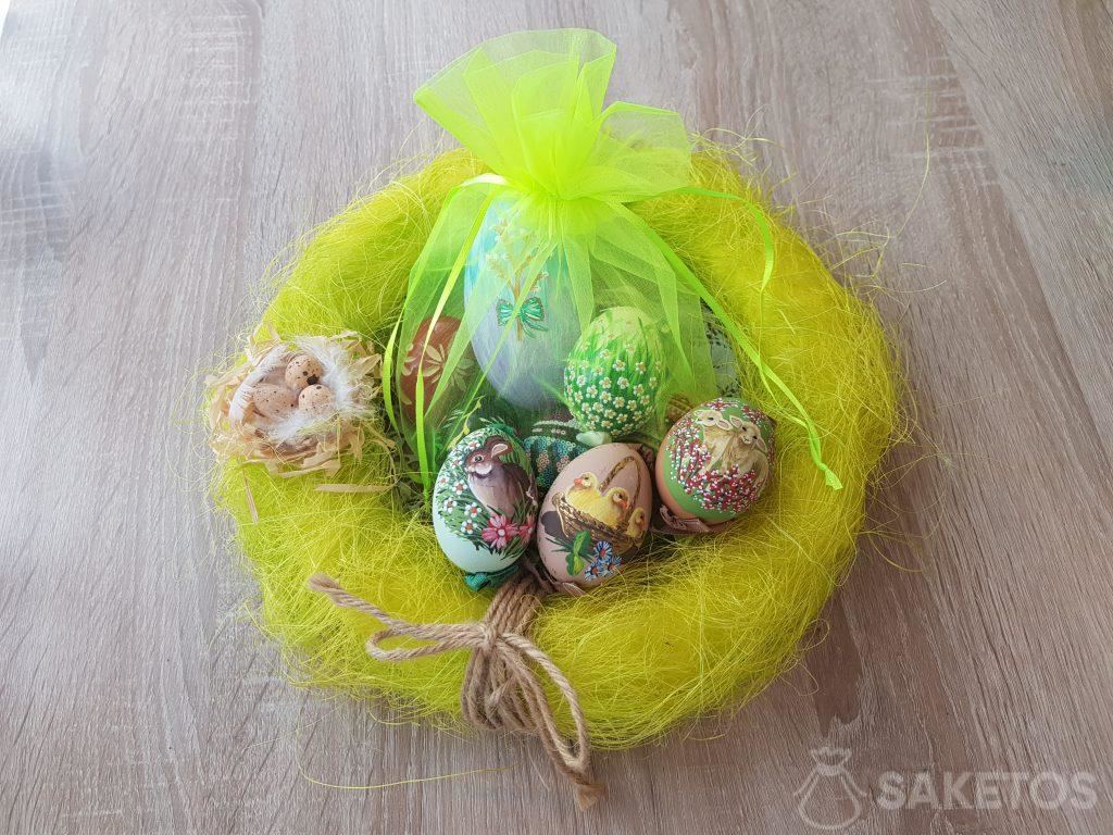 Hand-painted Easter eggs in neon green organza pouches