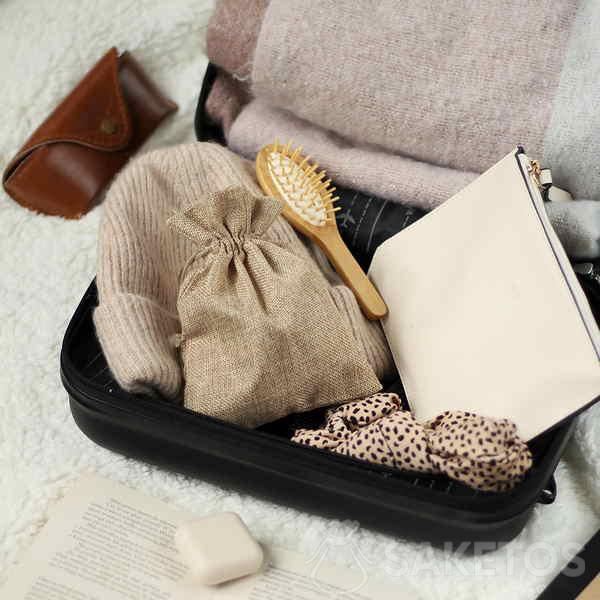 A jute bag as an organiser for a hand luggage