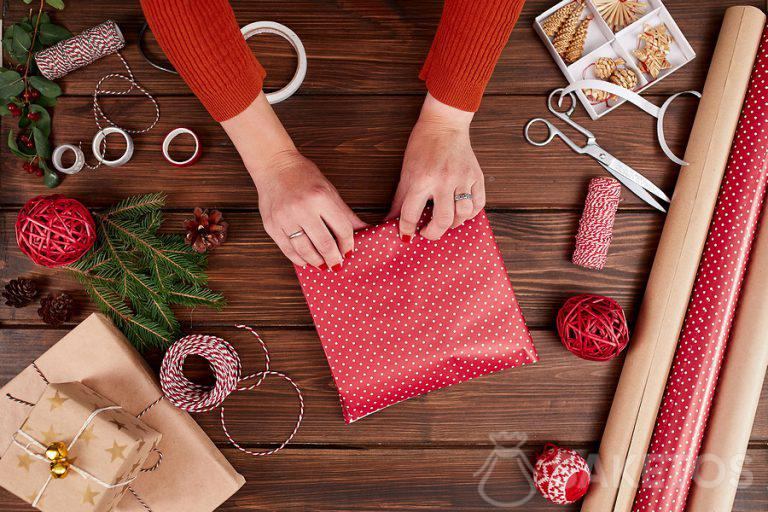 Wrapping a gift in paper