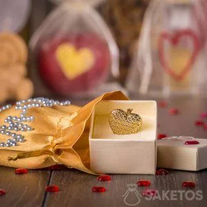 A golden satin pouch as a jewelery box