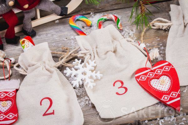 an Advent calendar made from linen pouches 