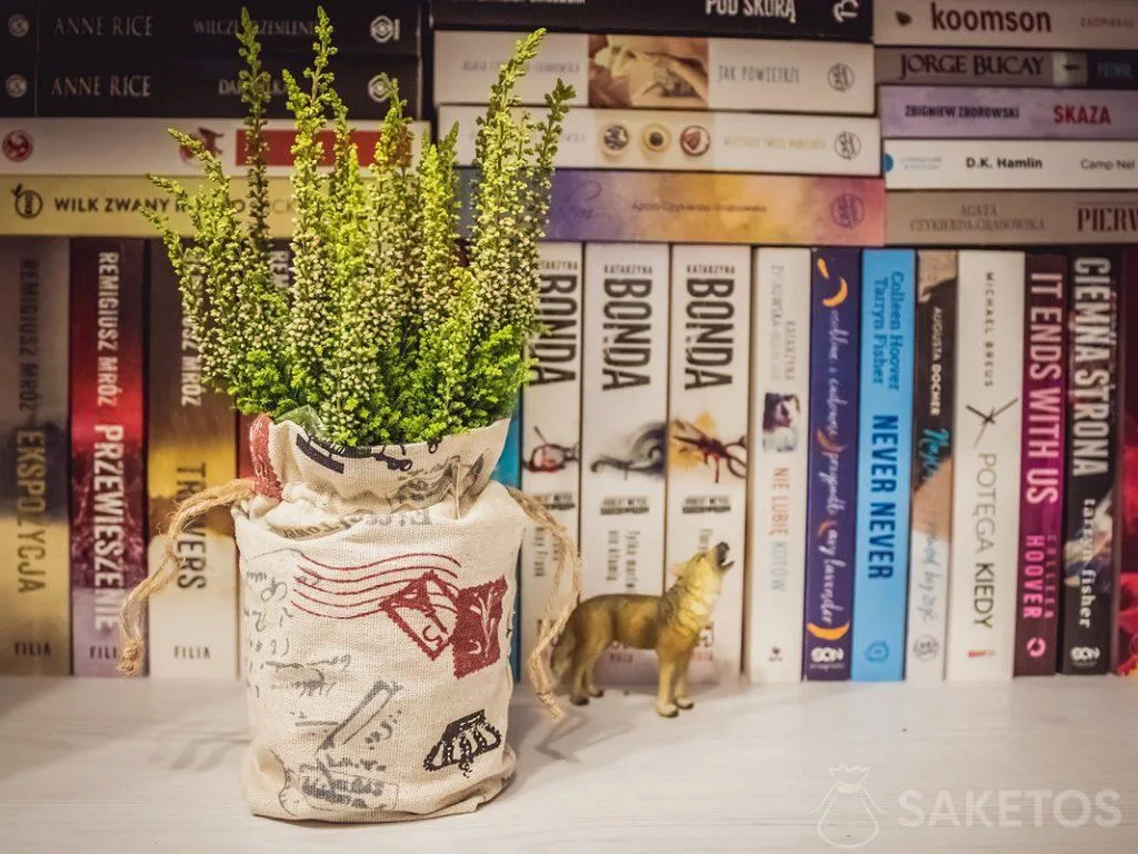 Linen bag with a decorative print as a flowerpot cover