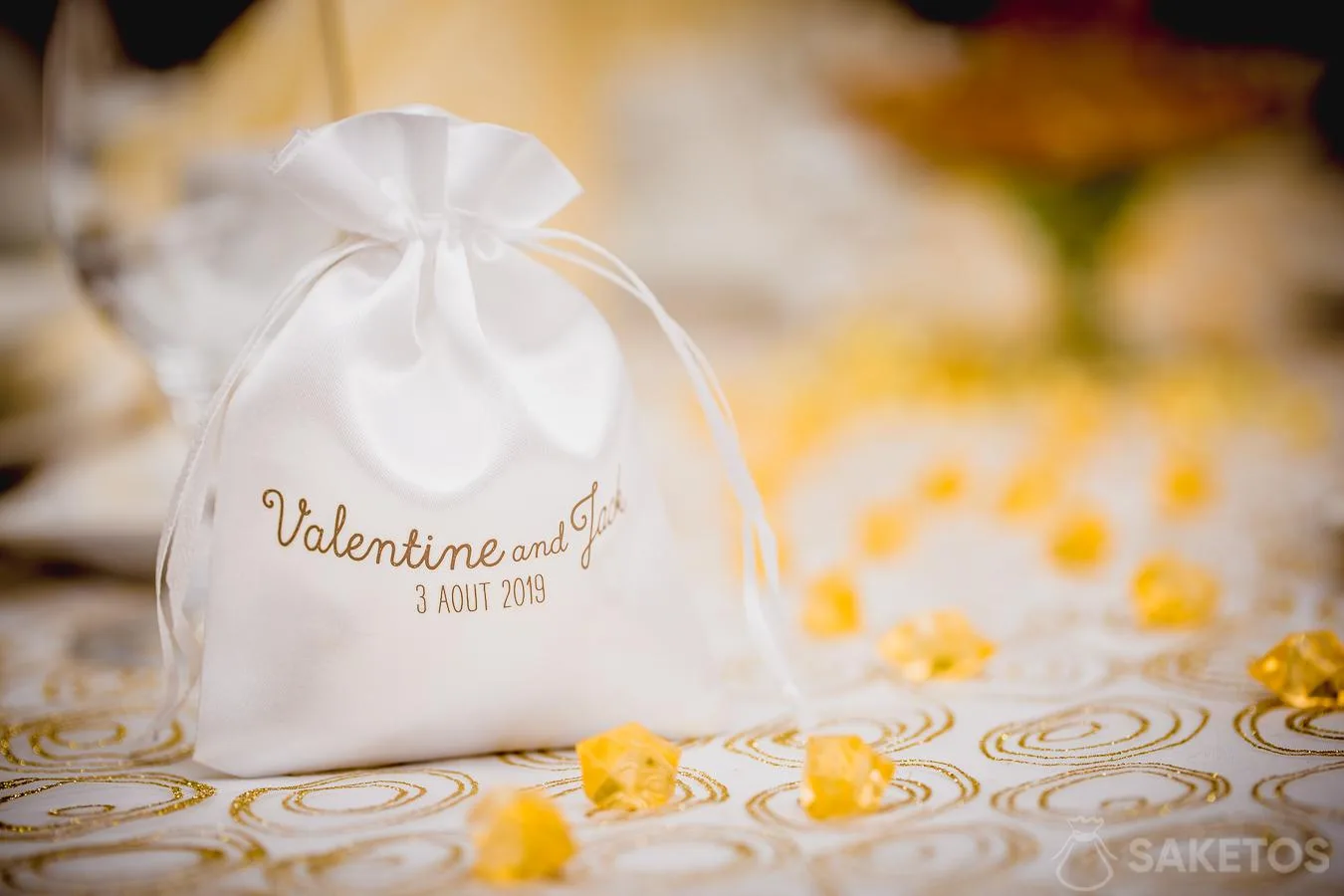 White satin wedding pouch with gold print