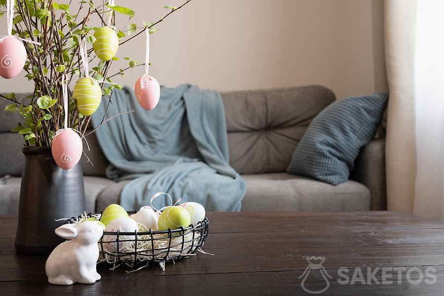 Vase with twigs and Easter eggs