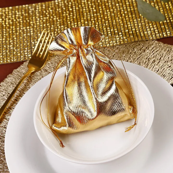 Gold metallic pouches for table decoration