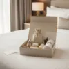 Linen Bags in luxury gift box with cosmetics in hotel room, stylish packaging set