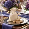 Linen Bags as table decoration with flowers, elegant packaging for guest gifts