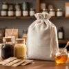 Linen bags for honey jar and natural products on wooden table