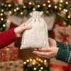 Linen bags as Christmas gift packaging with festive decorations